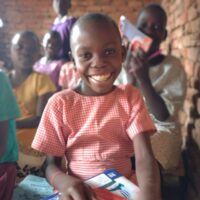 A $30 gift provides a child with tuition and supplies for a full term.